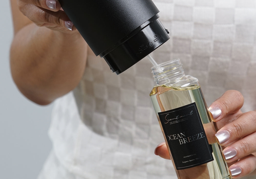 Remove the empty bottle and fill it with your preferred oil, or attach a 120ml bottle directly.