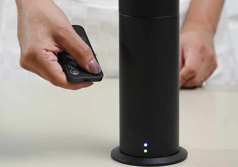 Ensure the device is plugged in, then use the remote to power on and customize your scent experience!