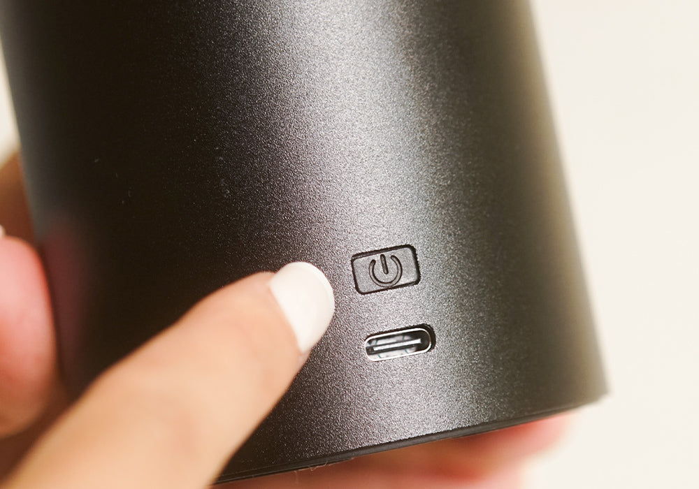 Plug in the diffuser, then press and hold the power button to turn it on. Press the power button to toggle between low, medium, and high mist.