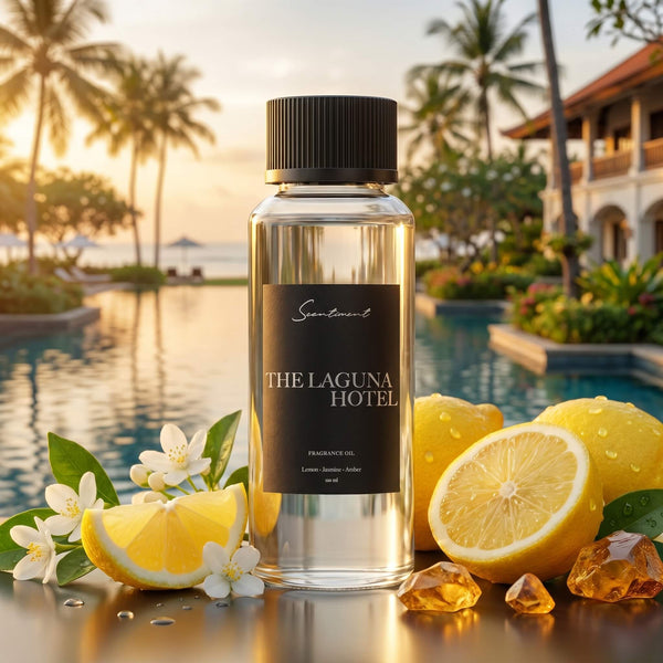 Scentiment The Laguna Hotel diffuser fragrance oil bottle with lemons, white flowers and amber stones overlooking the Montage hotel pool.