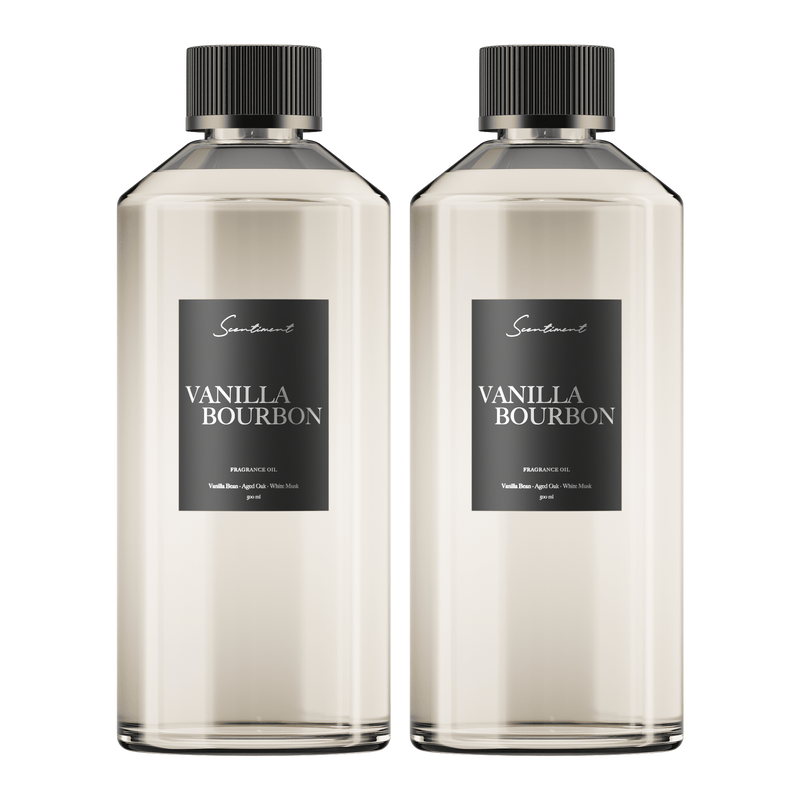 Scentiment Vanilla Bourbon fragrance oil with dark vanilla and aged oak notes in two 500 mL (16.9 fl oz) bottles
