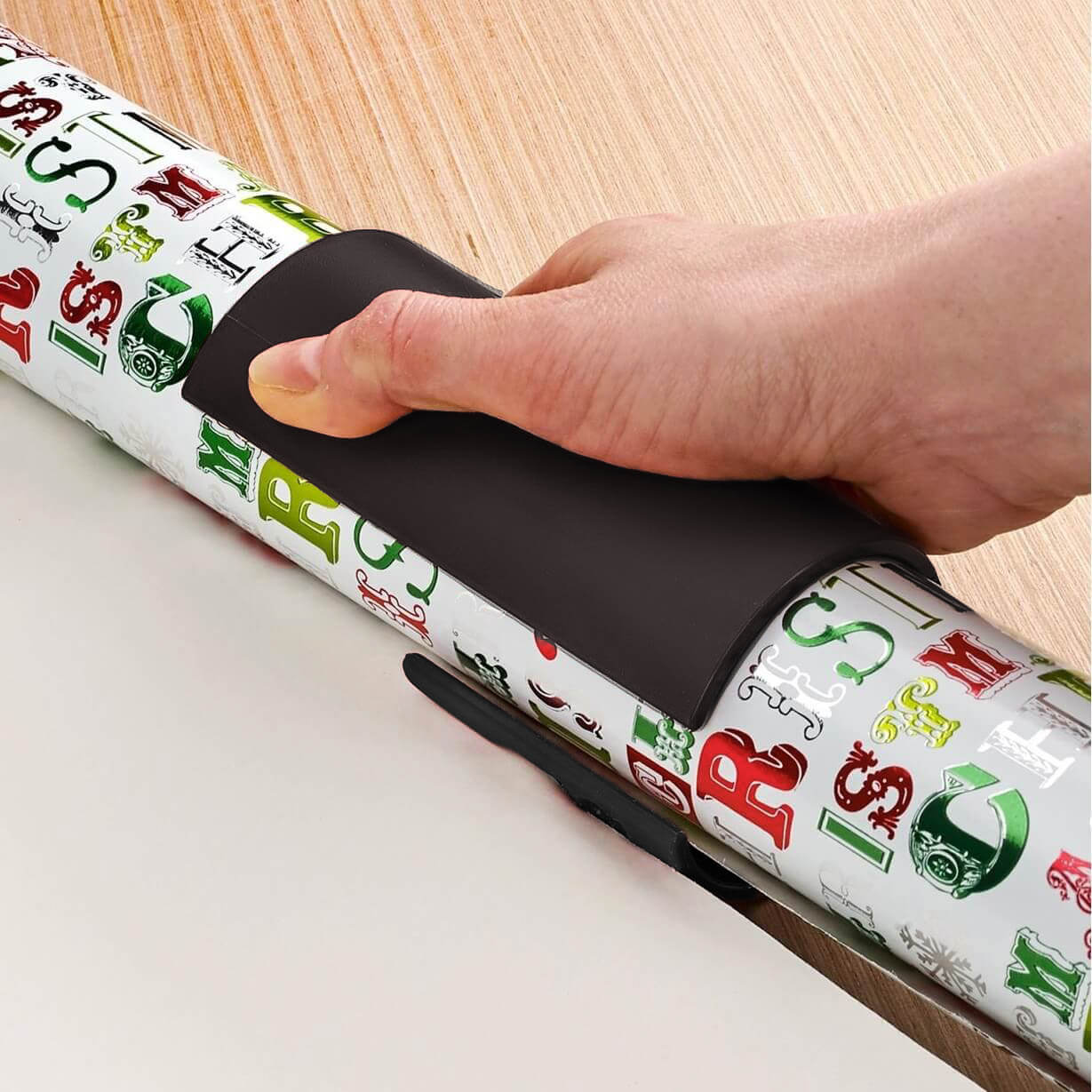 Do not buy the little elf gift wrap cutter!  I had a day trying to wrap  presents today. I decided to try out a new wrapping paper tool that turned  out